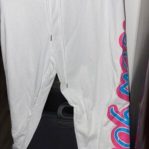 White Sweatpants with Pink and Blue Logo